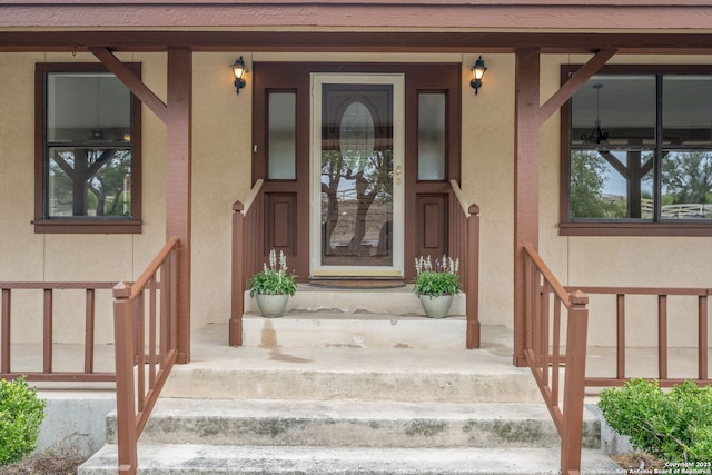 doorway to property with stucco siding