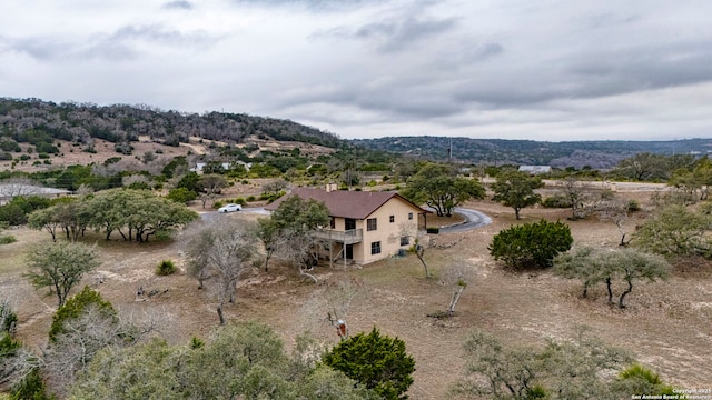 bird's eye view featuring a rural view and a mountain view