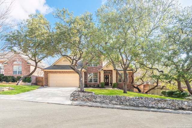 view of front of home with a garage and a front yard