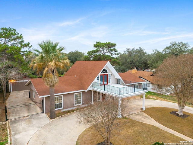 view of front of home with a balcony