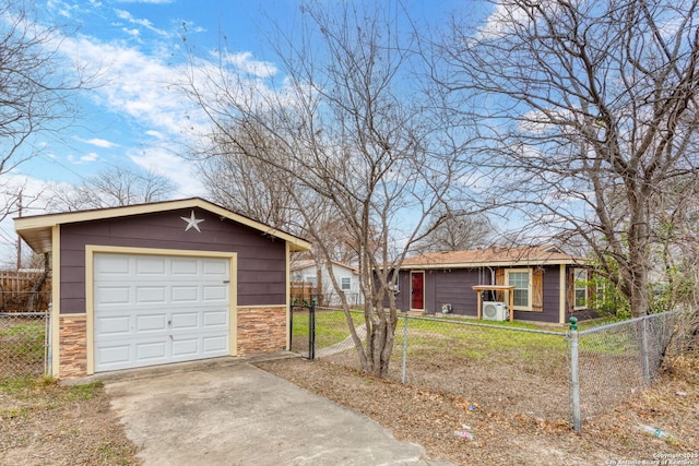 ranch-style home with a garage