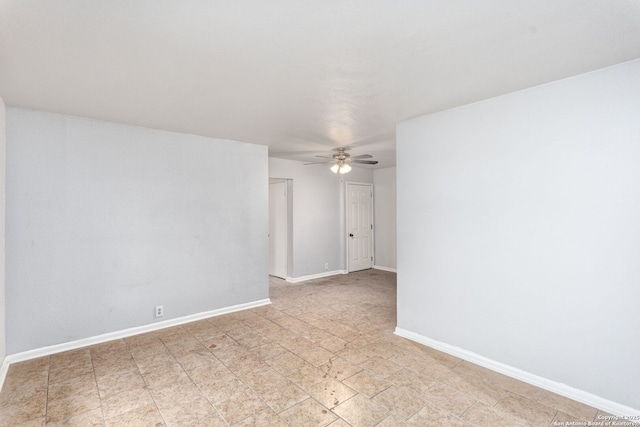 spare room with ceiling fan