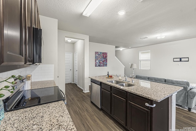 kitchen with tasteful backsplash, sink, dark brown cabinetry, stainless steel appliances, and dark wood-type flooring