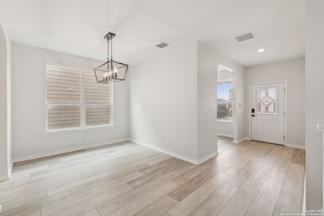 unfurnished dining area featuring light wood-type flooring, baseboards, visible vents, and recessed lighting