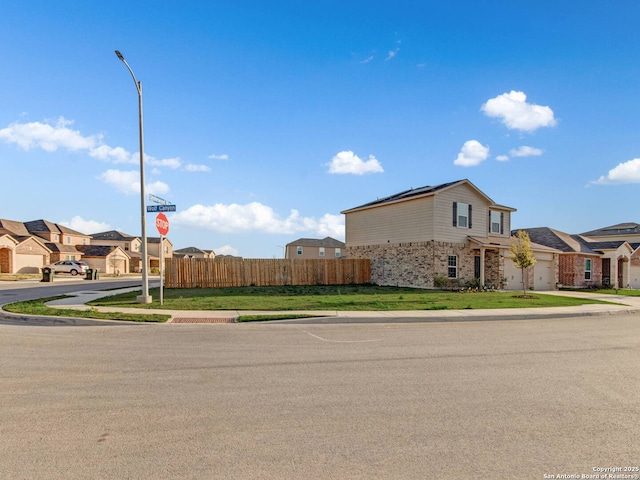 view of front of property with a front lawn