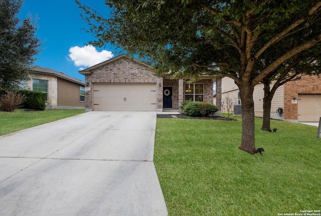 ranch-style house featuring a garage and a front yard