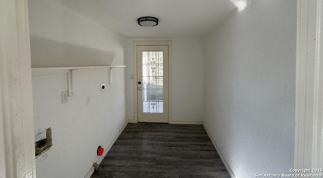 doorway to outside with dark hardwood / wood-style flooring