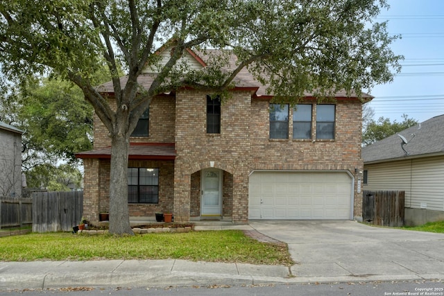 view of front of property with a garage