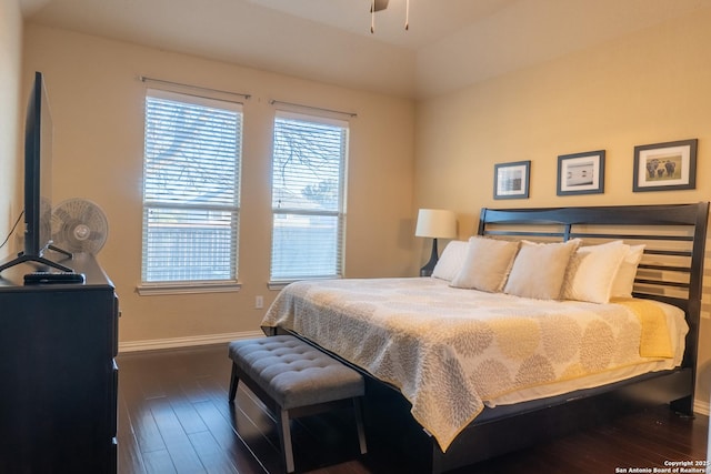 bedroom featuring dark hardwood / wood-style flooring