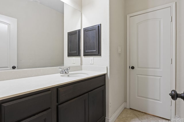 bathroom with vanity and tile patterned flooring