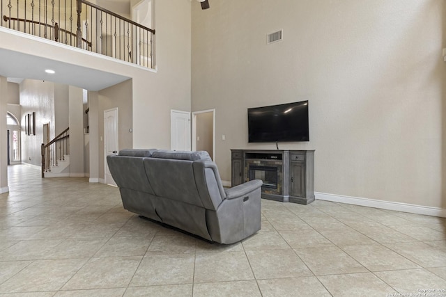 living room with light tile patterned floors