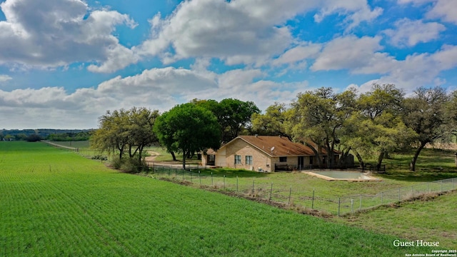 view of yard with a rural view