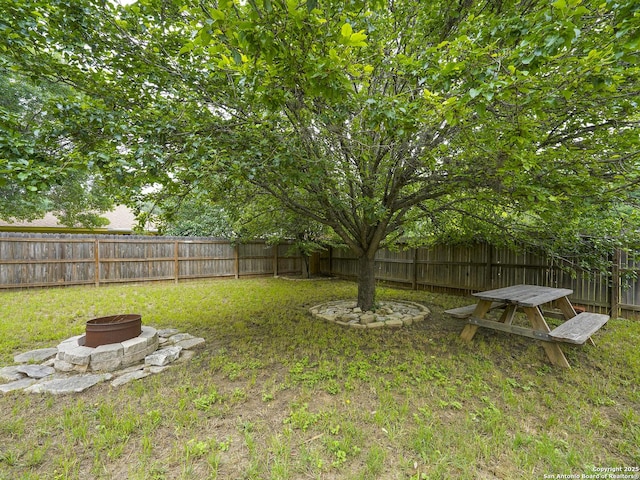 11723 Shotgun Way, Helotes, TX 78023 - view of yard featuring a fenced backyard and a fire pit