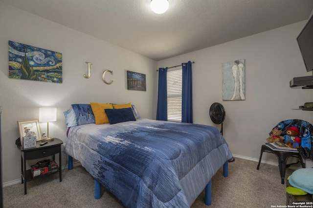 bedroom featuring light carpet