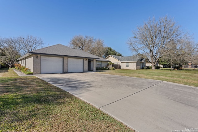 single story home featuring a garage and a front yard