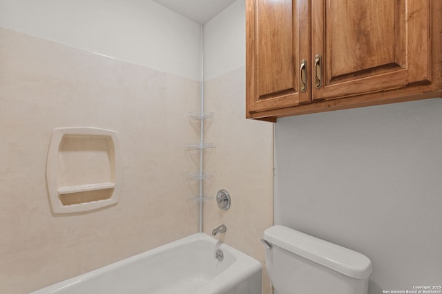 bathroom featuring toilet and shower / bath combination