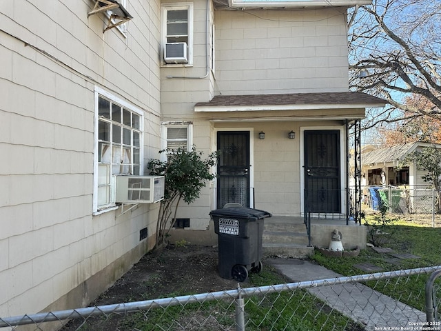 doorway to property featuring cooling unit