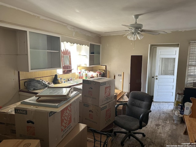 office featuring hardwood / wood-style flooring and ceiling fan