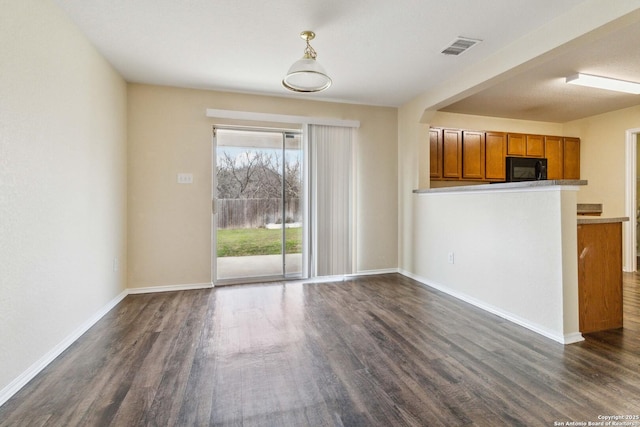 interior space featuring dark hardwood / wood-style floors