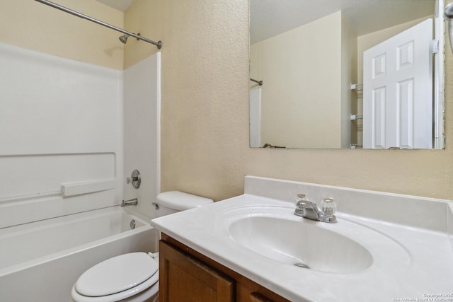 full bathroom with vanity, shower / washtub combination, and toilet