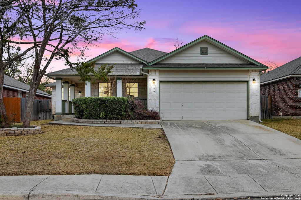 view of front of property with a garage