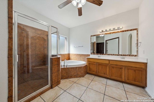 bathroom featuring ceiling fan, vanity, separate shower and tub, and tile patterned flooring