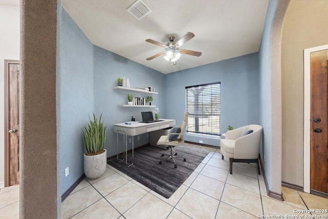 tiled home office with lofted ceiling and ceiling fan