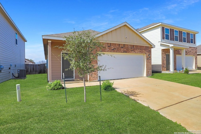 view of front of property featuring cooling unit, a garage, and a front lawn