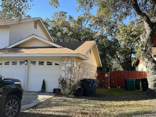 view of home's exterior featuring a garage