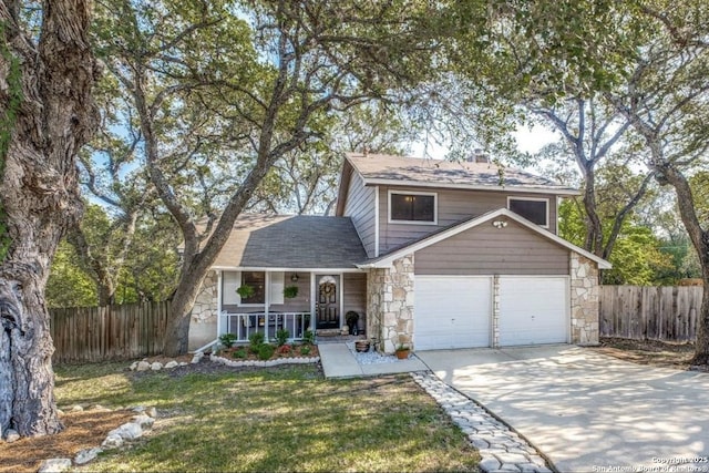 front of property with a garage and covered porch