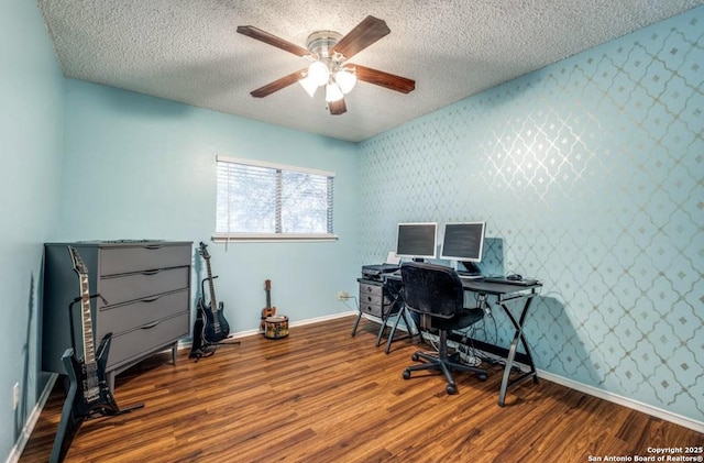 office with ceiling fan, hardwood / wood-style floors, and a textured ceiling