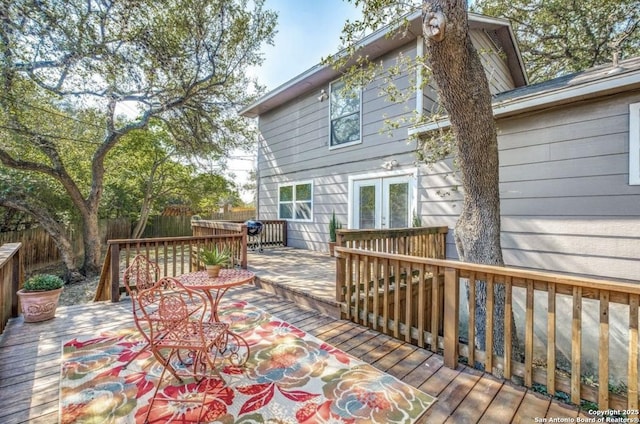 wooden terrace featuring french doors