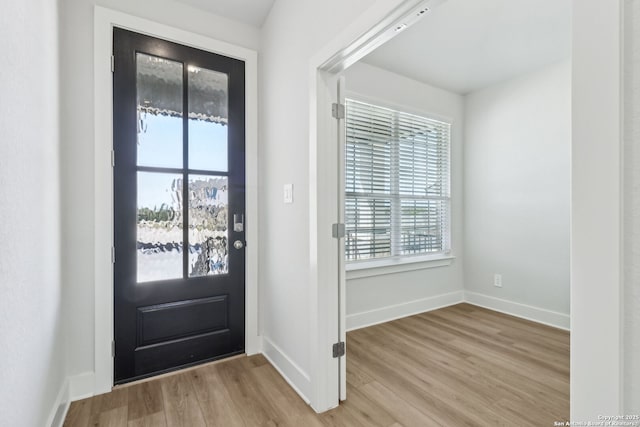 14603 Rainwater Trl, San Antonio, TX 78253 - entryway with baseboards and wood finished floors