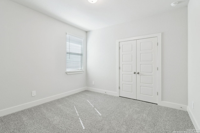 14603 Rainwater Trl, San Antonio, TX 78253 - unfurnished bedroom with a closet, carpet, and baseboards