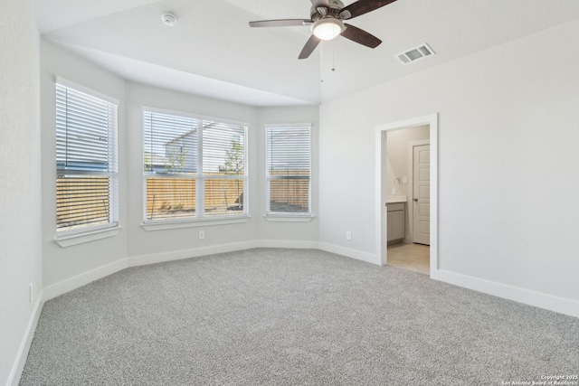 14603 Rainwater Trl, San Antonio, TX 78253 - spare room featuring light carpet, baseboards, visible vents, and ceiling fan