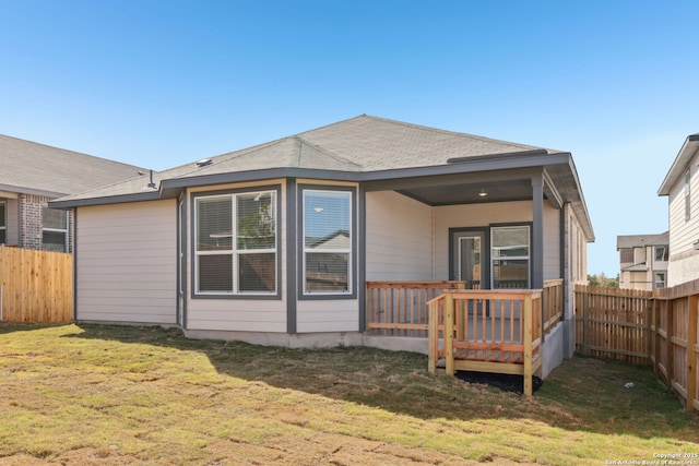 14603 Rainwater Trl, San Antonio, TX 78253 - back of property featuring a fenced backyard, a lawn, and roof with shingles