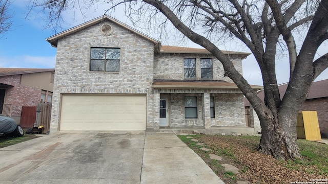 view of front of home with a garage and covered porch