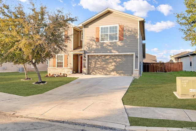 view of front facade featuring a garage and a front yard