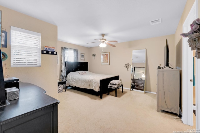 carpeted bedroom featuring ceiling fan