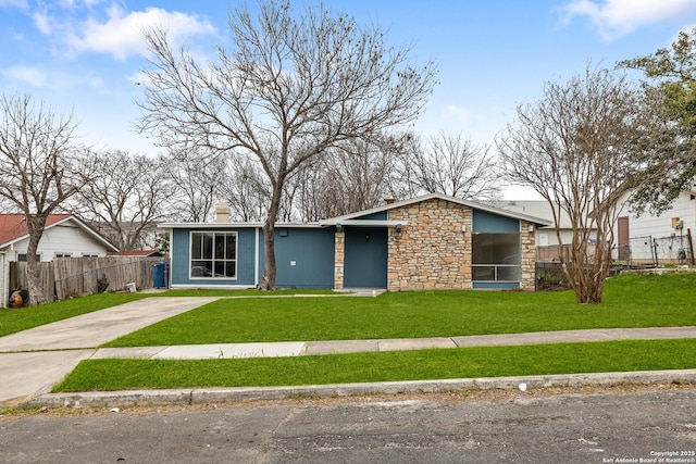 view of front of home with a front yard