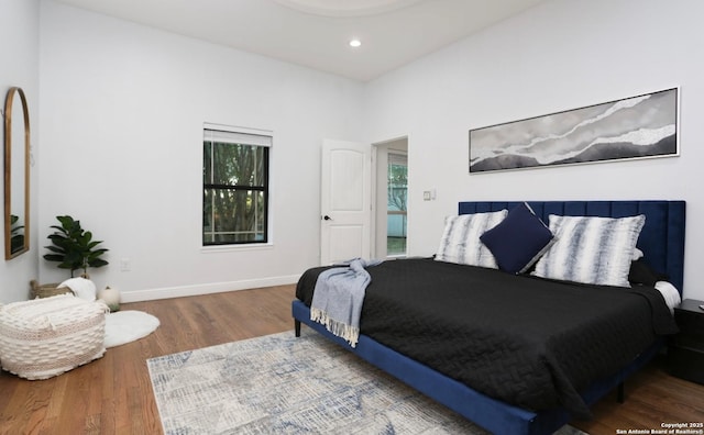 bedroom featuring hardwood / wood-style floors