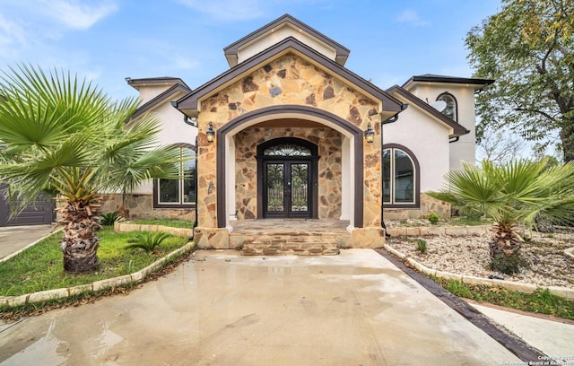 doorway to property with french doors