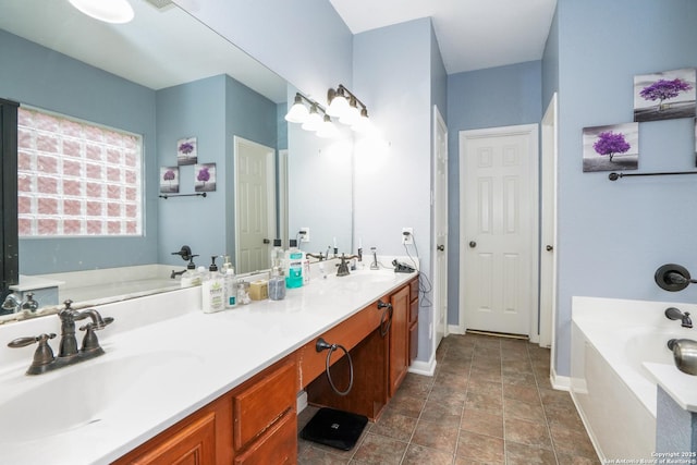 bathroom featuring vanity and a tub to relax in