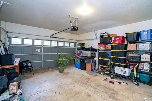 garage featuring a garage door opener