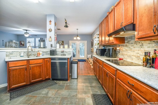 kitchen featuring french doors, sink, decorative light fixtures, black appliances, and backsplash