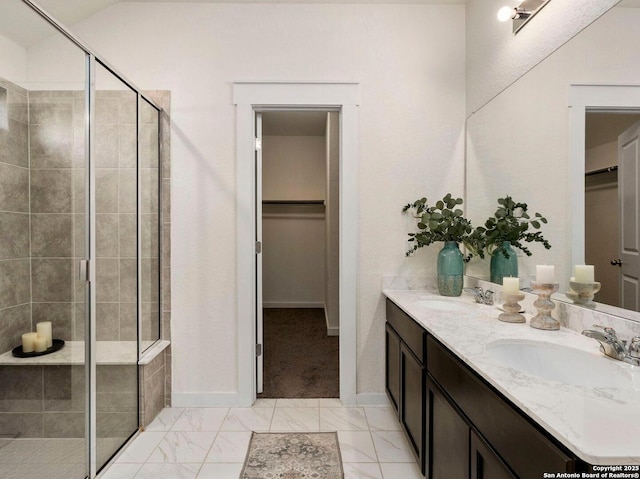 bathroom featuring vanity and walk in shower