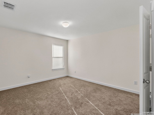 view of carpeted spare room