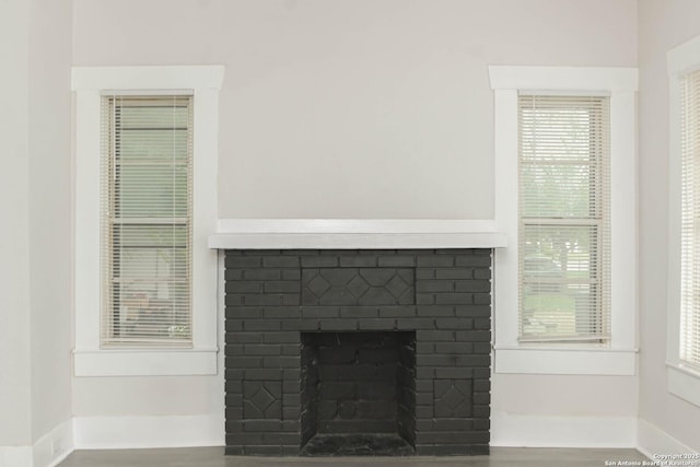 interior details featuring a fireplace