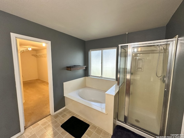 bathroom featuring plus walk in shower