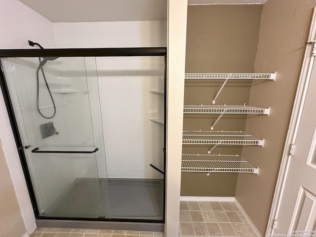 bathroom featuring an enclosed shower